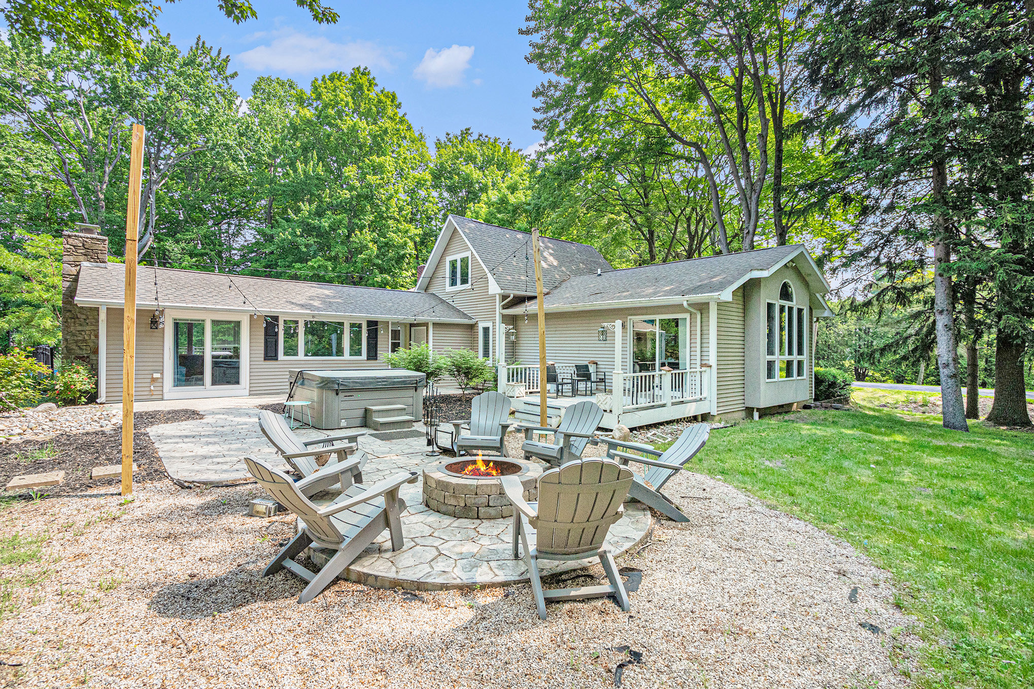 Cozy house with fire pit and patio chairs