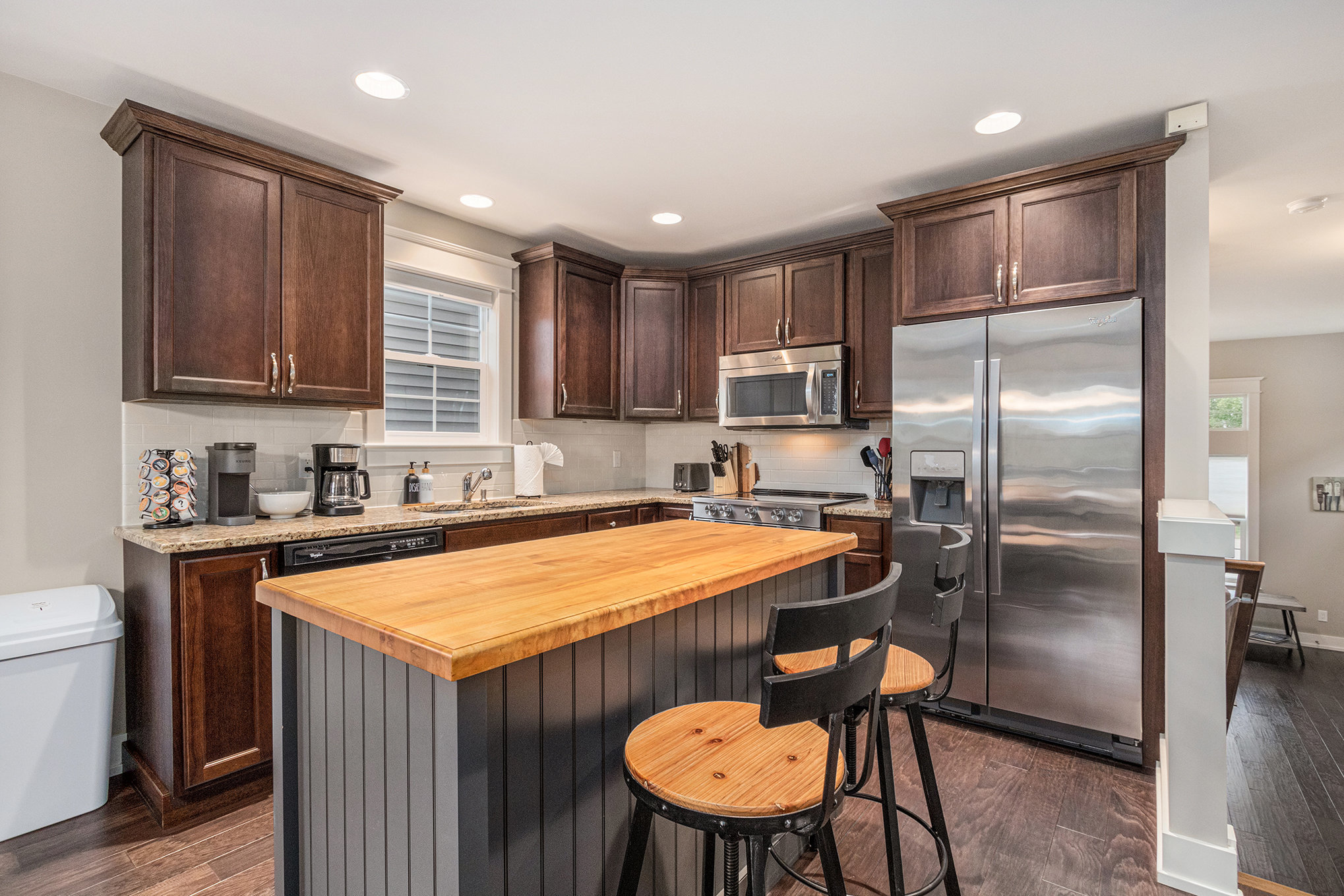 Modern kitchen with wooden cabinets and island