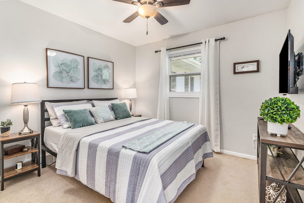 Modern bedroom with bed and window view