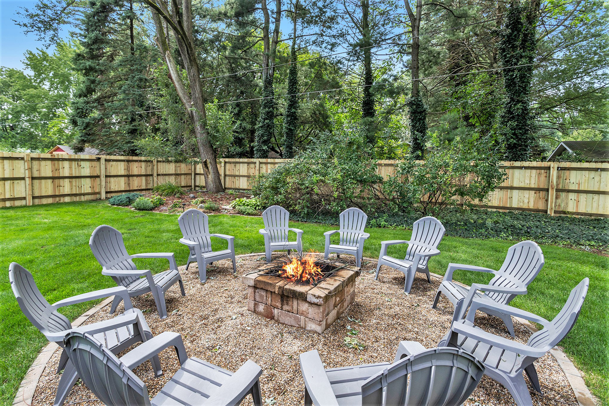 Backyard fire pit with outdoor seating area