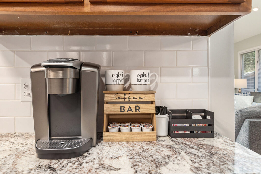 Home coffee bar setup with coffee maker