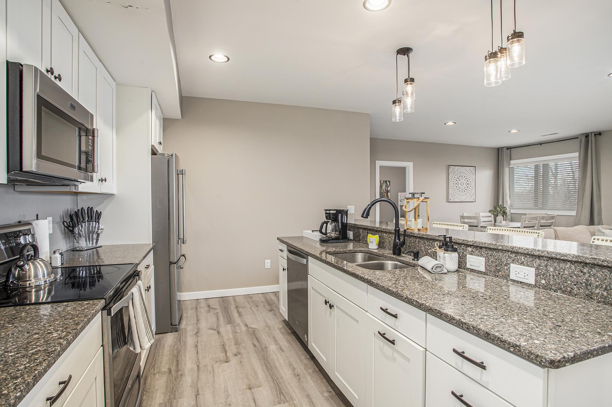 Modern kitchen with granite countertops and stainless appliances
