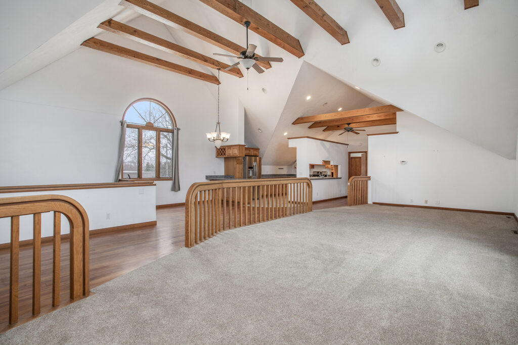 Spacious loft with wood beams and open kitchen