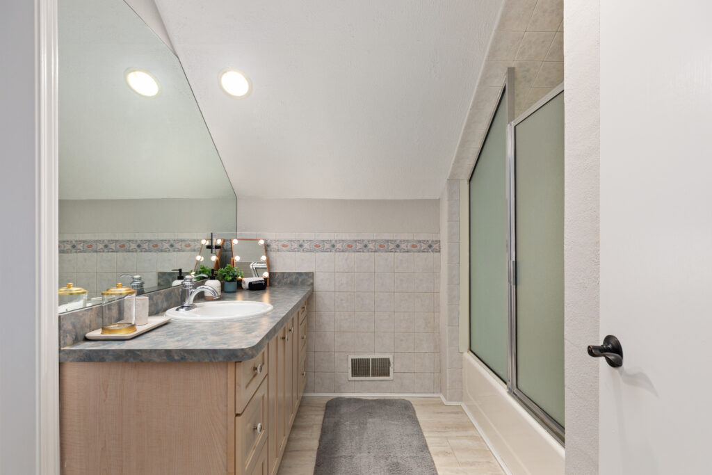 Modern bathroom with vanity and shower area