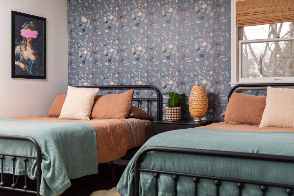 Modern bedroom with two twin beds and decor