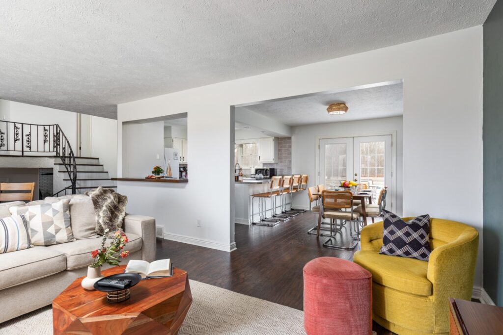 Modern open living room with kitchen and dining area