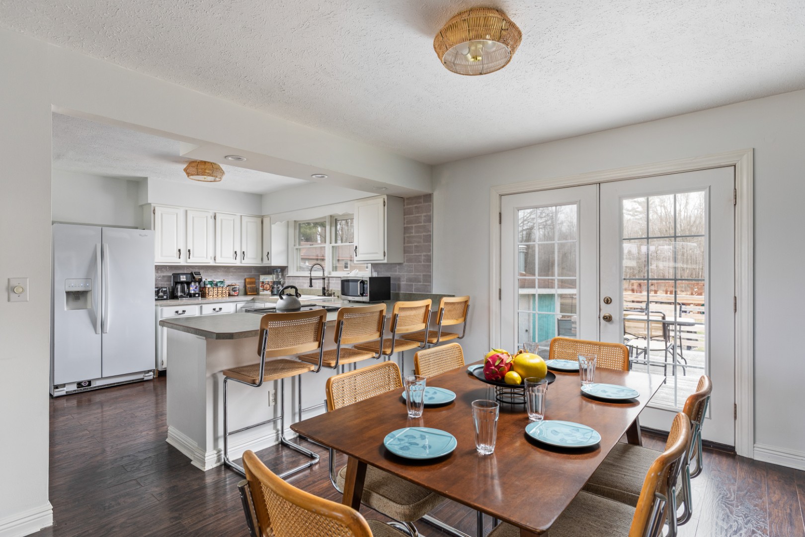 Modern kitchen and dining area with natural light