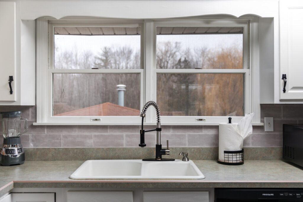 Modern kitchen sink with window view