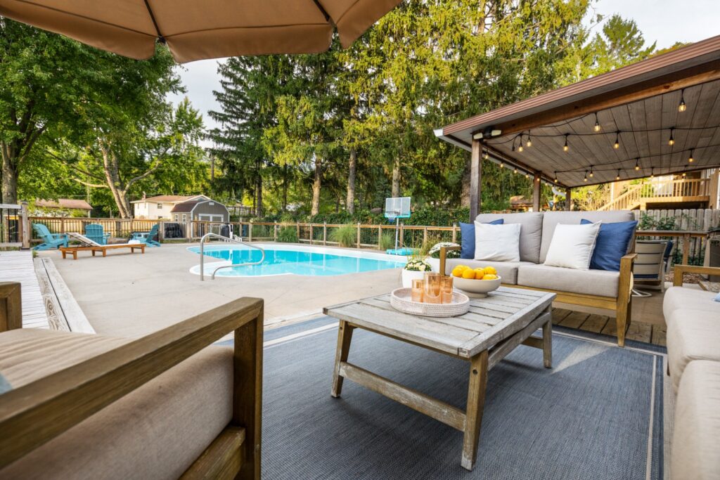 Cozy backyard patio with pool and outdoor seating