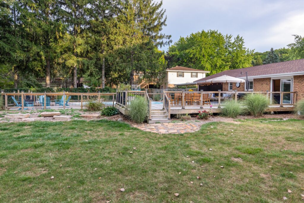 Backyard deck with seating and garden view