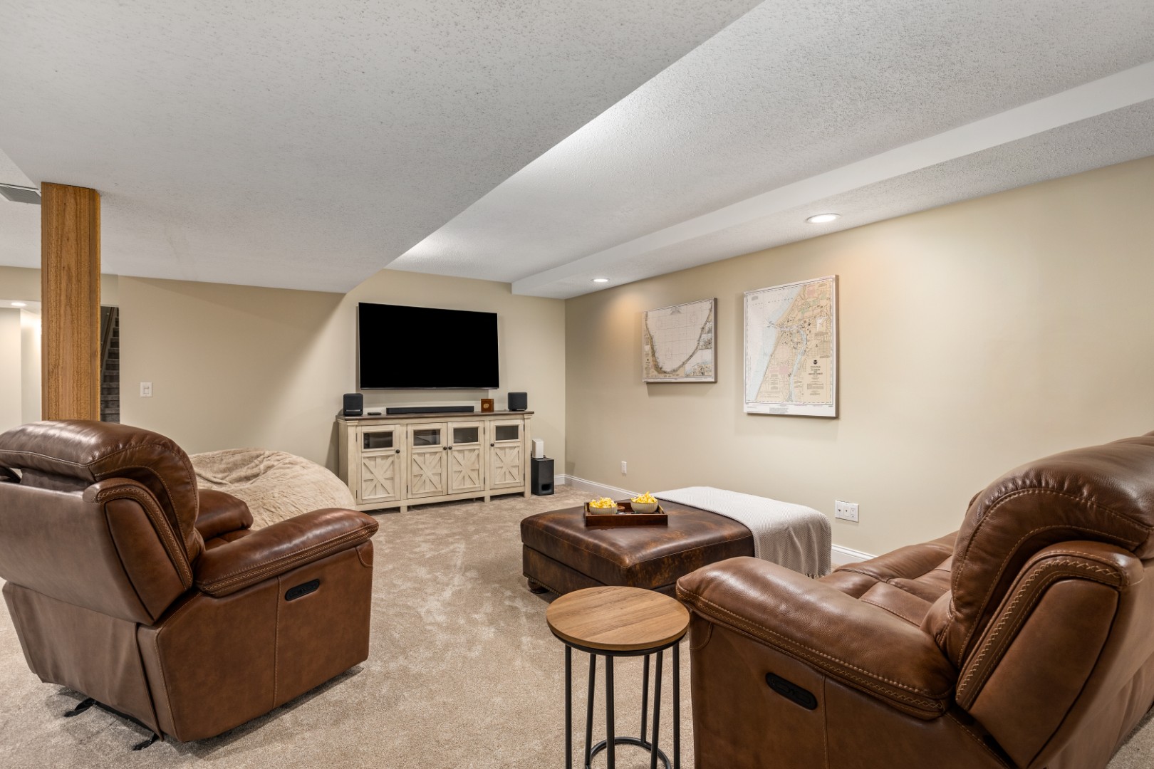 Cozy basement home theater with leather recliners