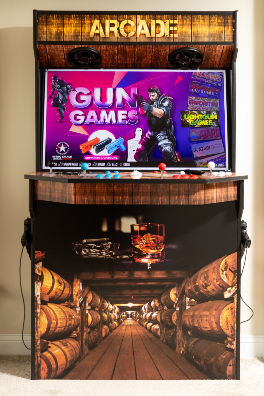 Retro arcade machine with gun games display