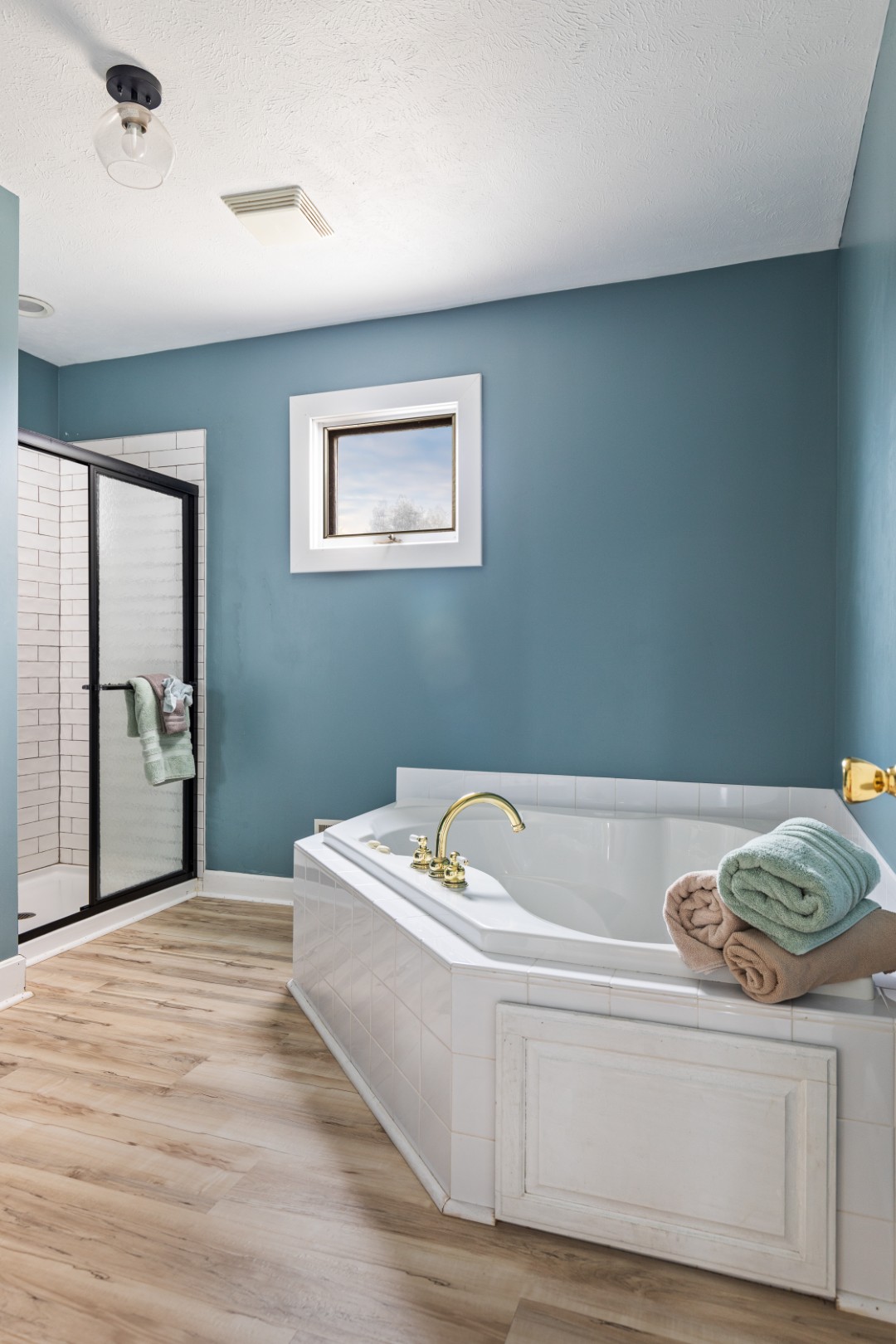 Modern bathroom with bathtub and shower