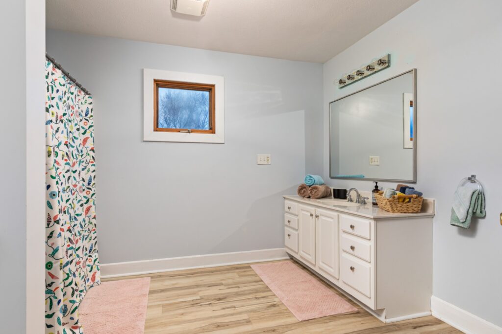 Modern bathroom with vanity and shower curtain