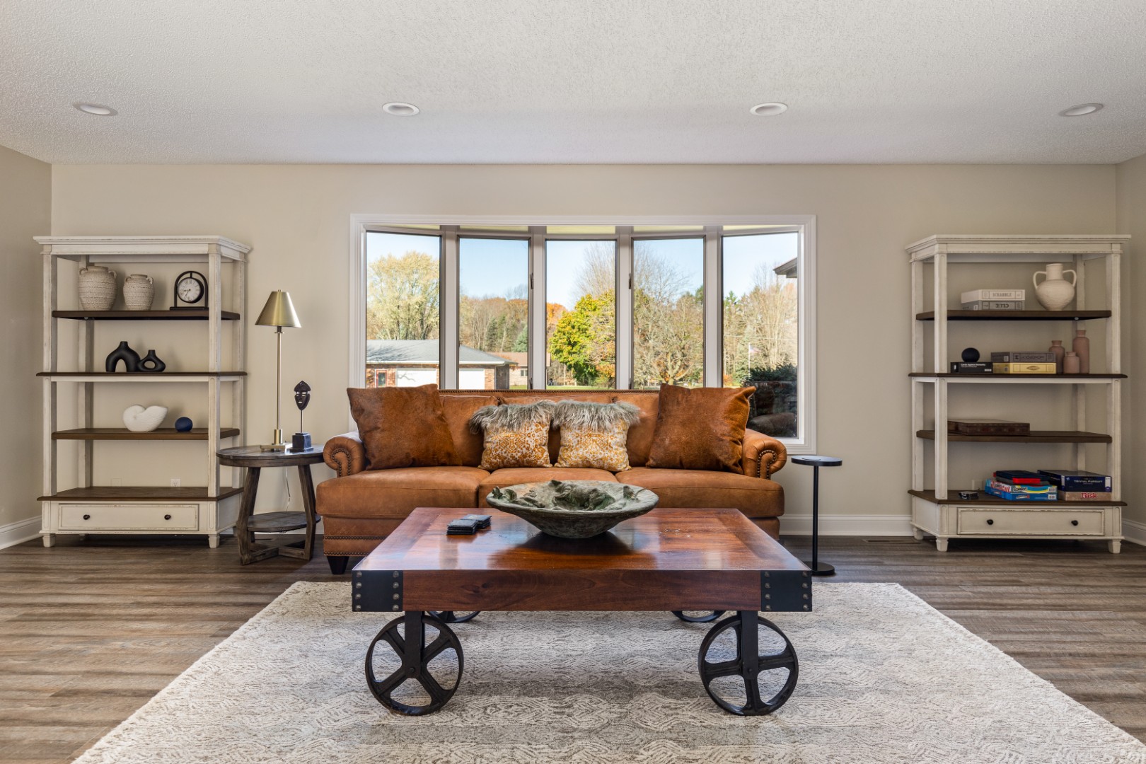 Modern living room with brown leather sofa