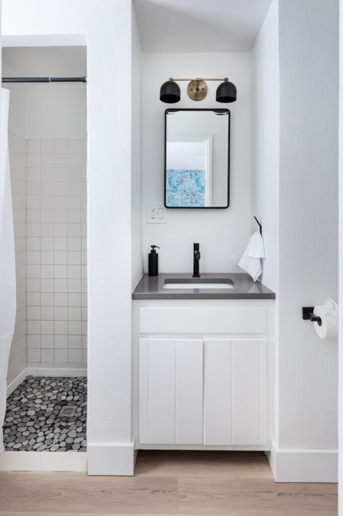 Modern white bathroom with vanity and shower