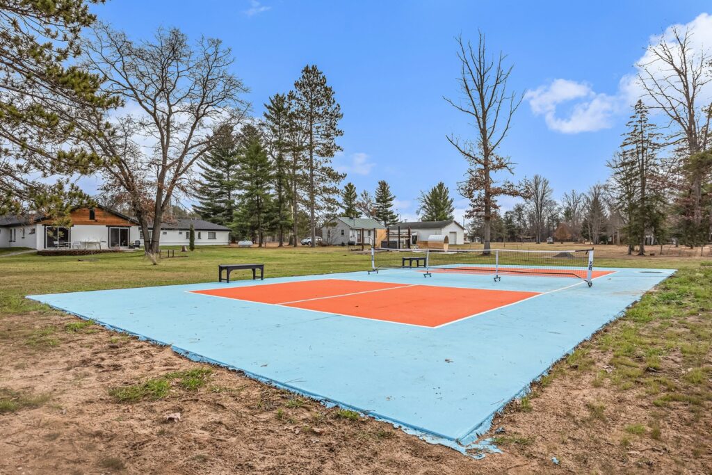 Outdoor pickleball court near residential homes
