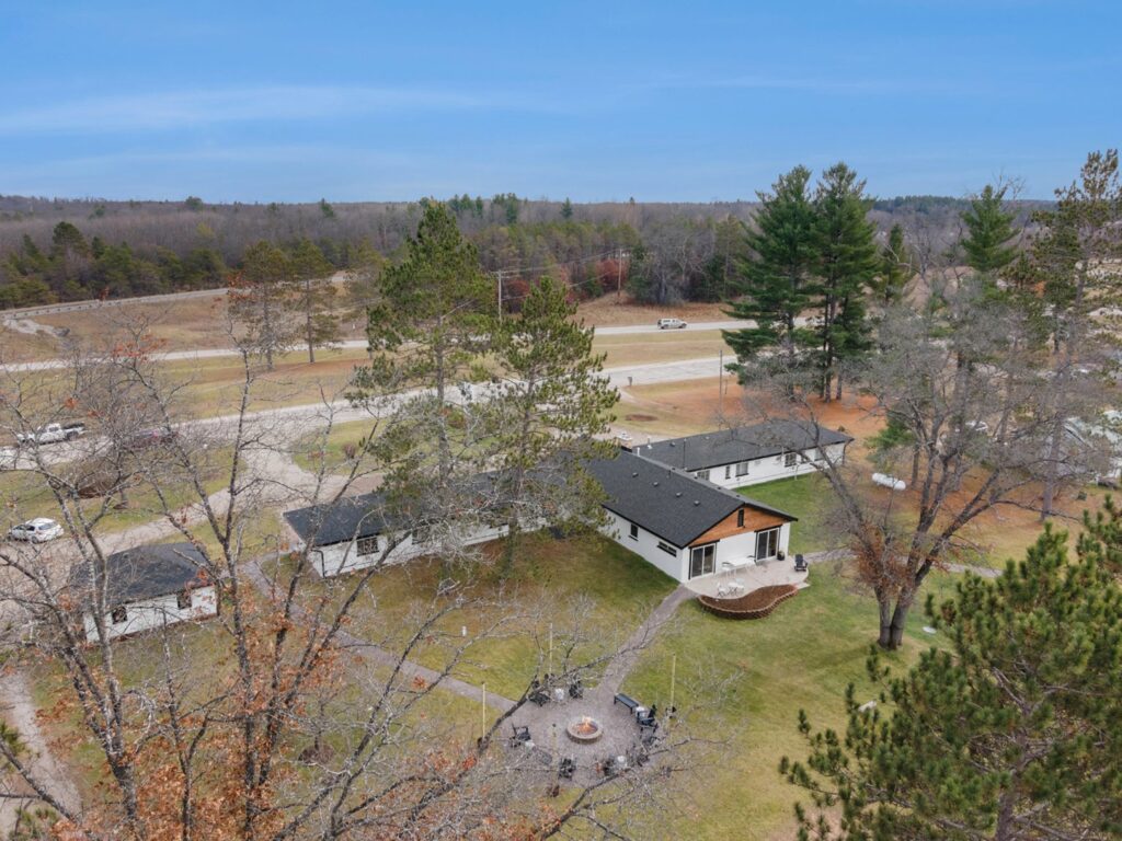 Aerial view of countryside houses and trees