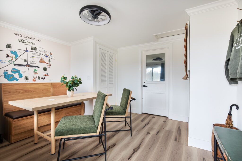 Cozy lodge dining area with wooden table and chairs