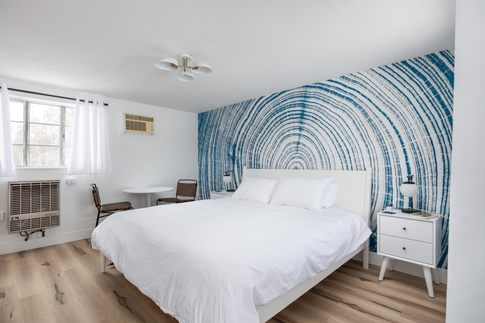 Modern bedroom with blue accent wall design