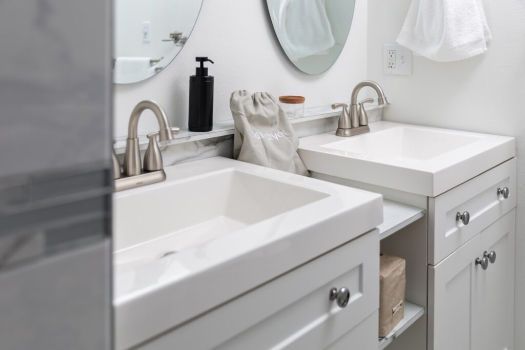 Modern bathroom with double sinks and mirrors