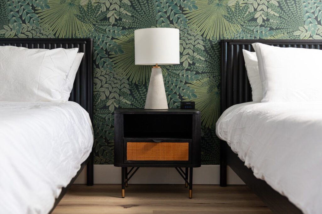 Modern bedroom with twin beds and lamp