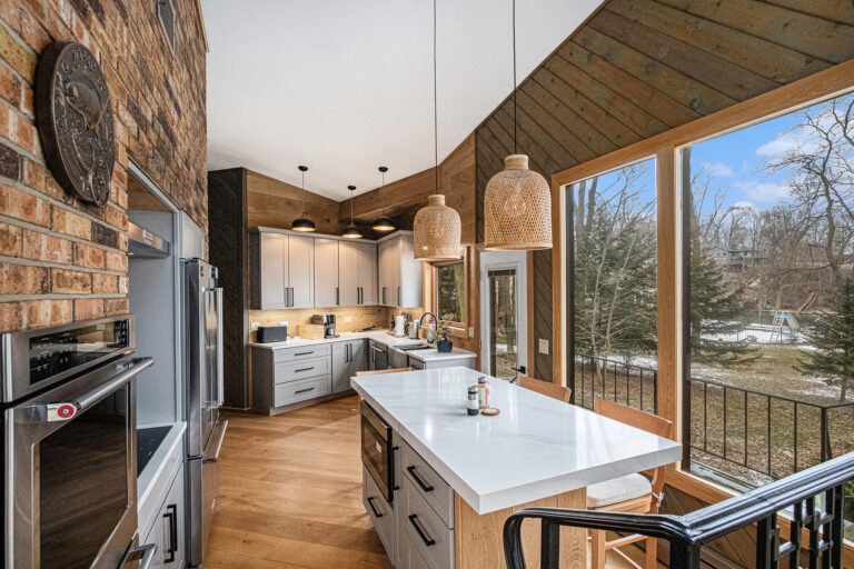 Modern kitchen with large windows and island