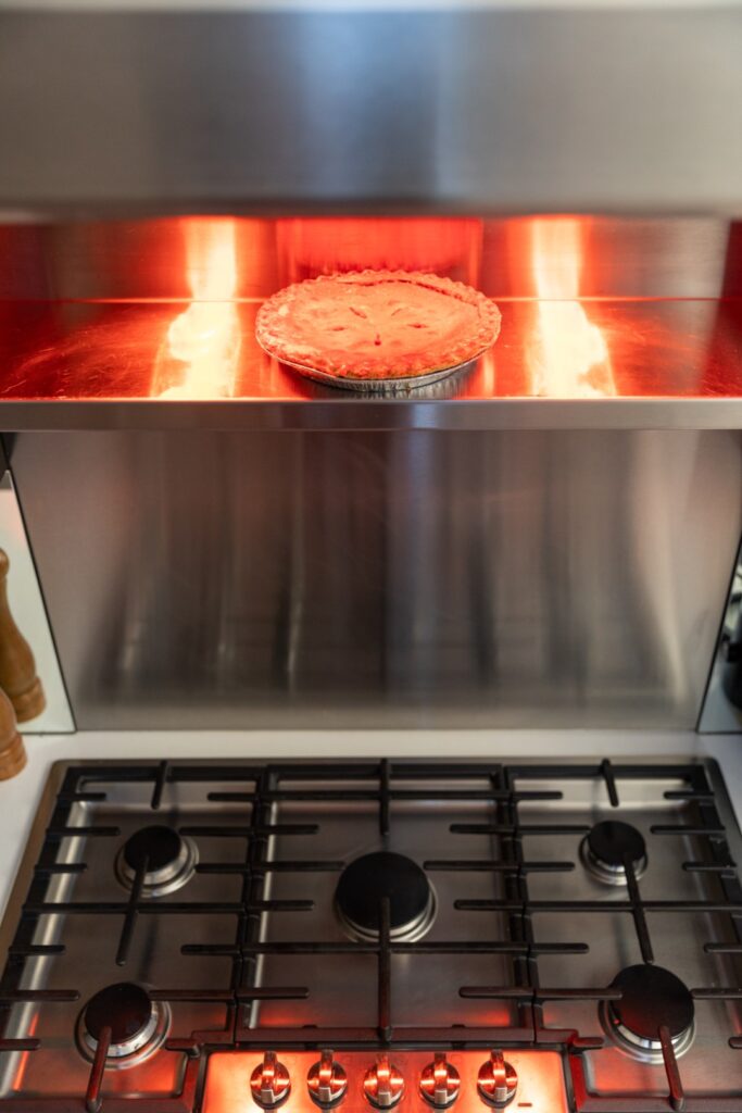 Pie baking in stainless steel oven