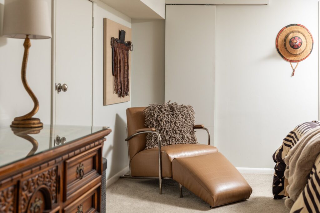 Cozy bedroom corner with leather lounge chair