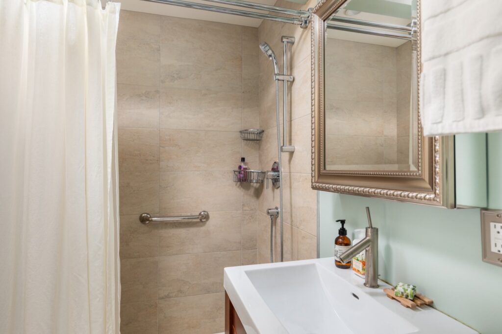 Modern bathroom with shower and vanity sink