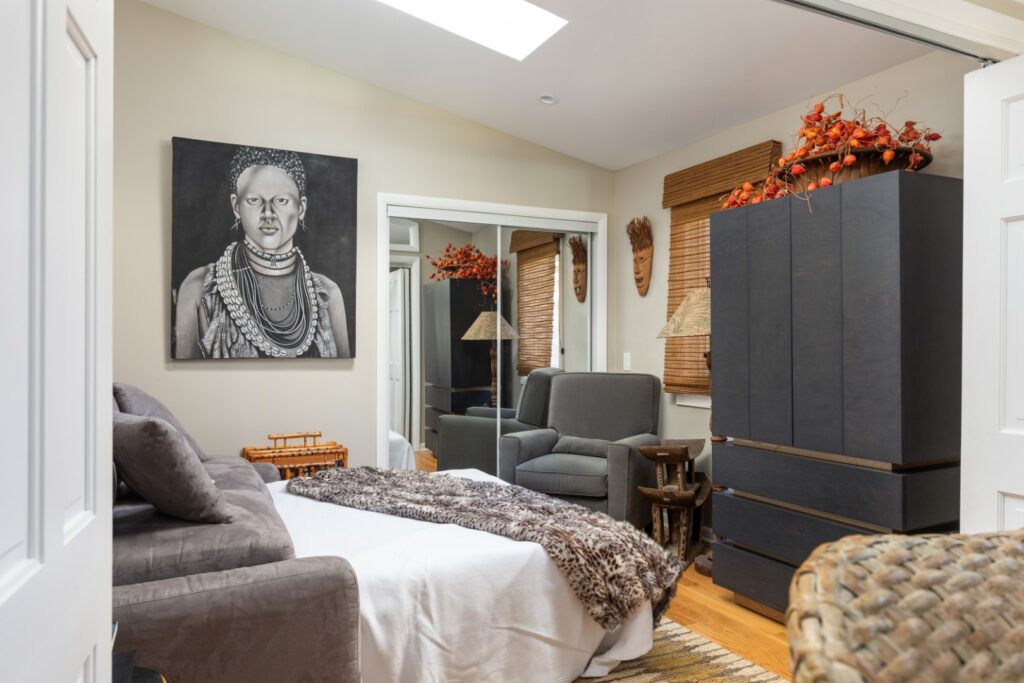 Cozy bedroom with modern decor and artwork