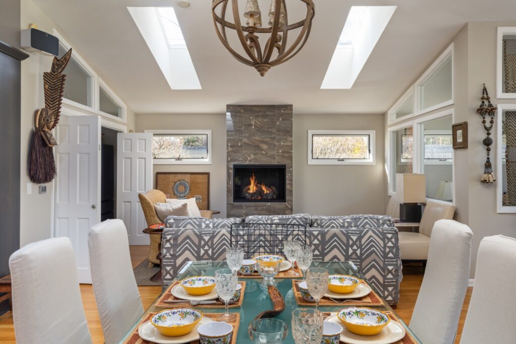 Modern dining and living room with fireplace