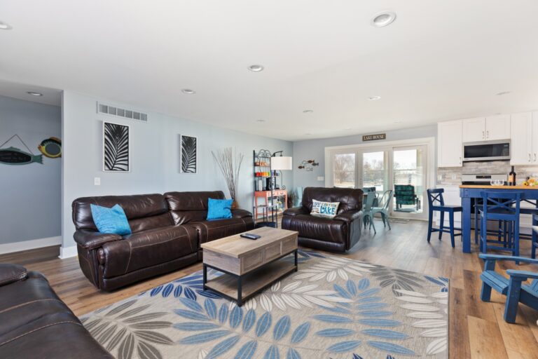 Modern living room with brown leather sofas
