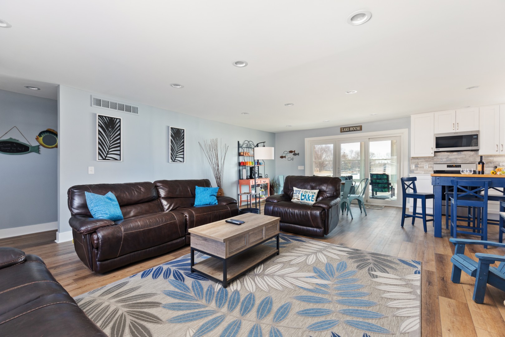 Modern living room with brown leather sofas
