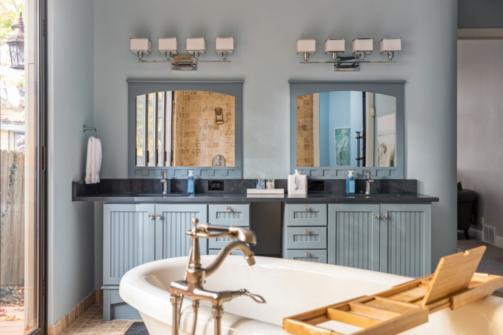 Modern bathroom with double sinks and bathtub