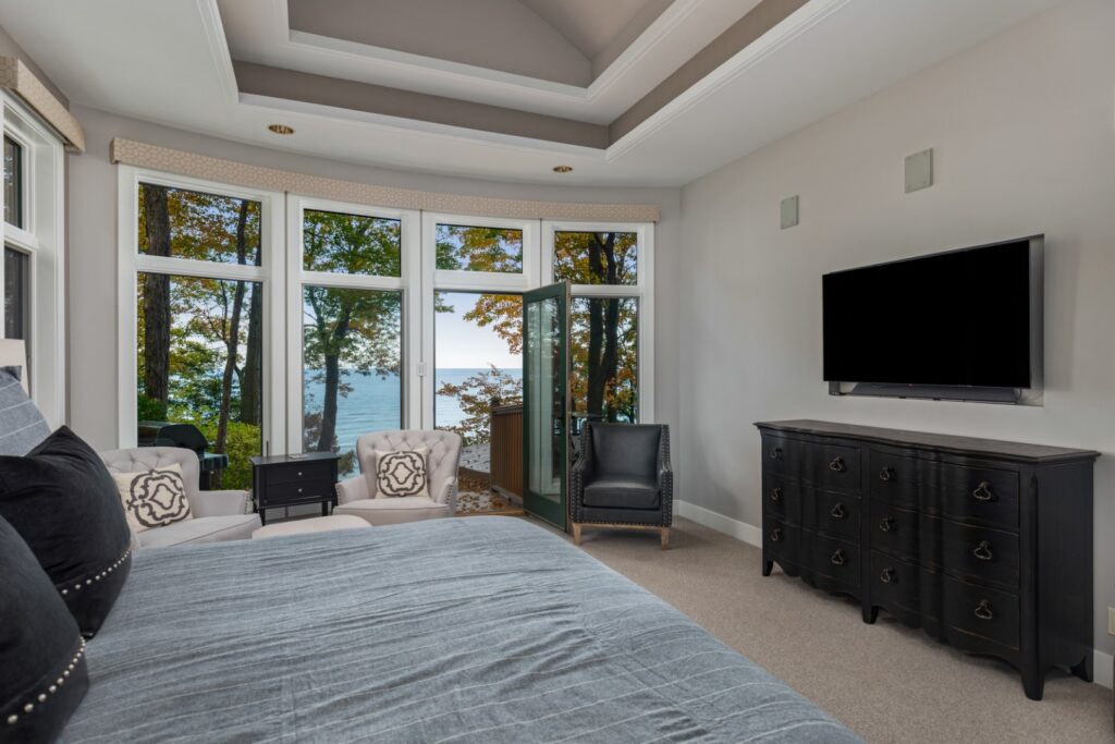 Bedroom with lake view and modern decor