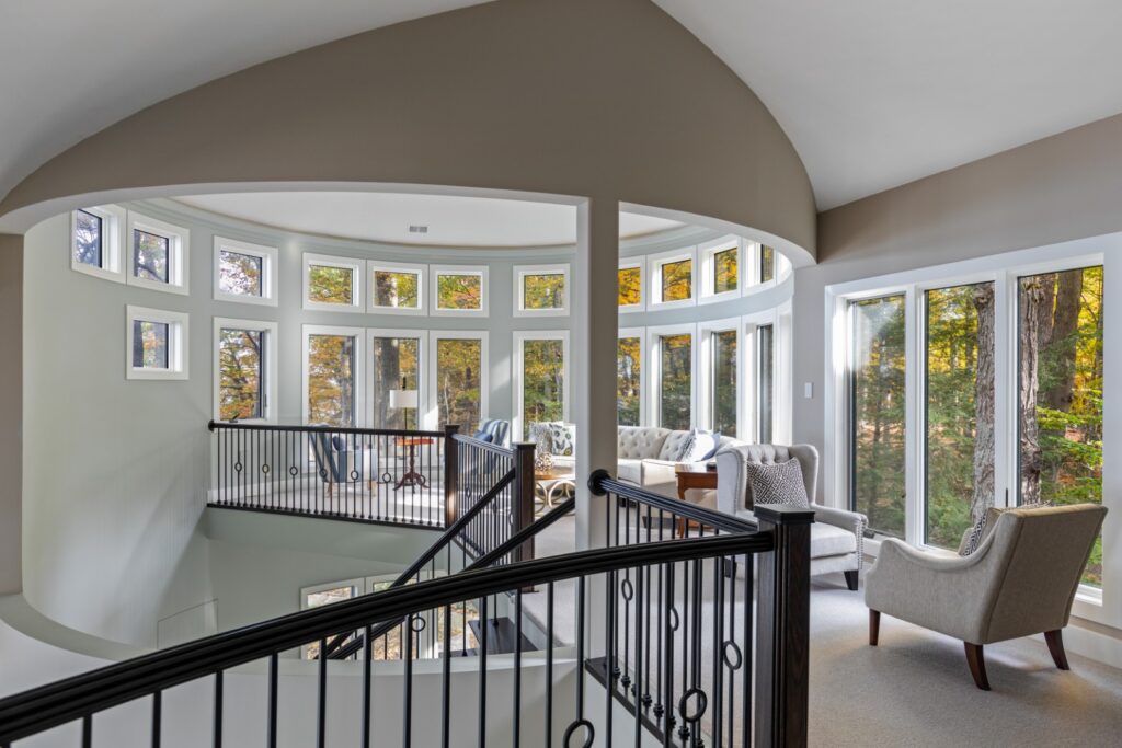 Modern living room with large curved windows