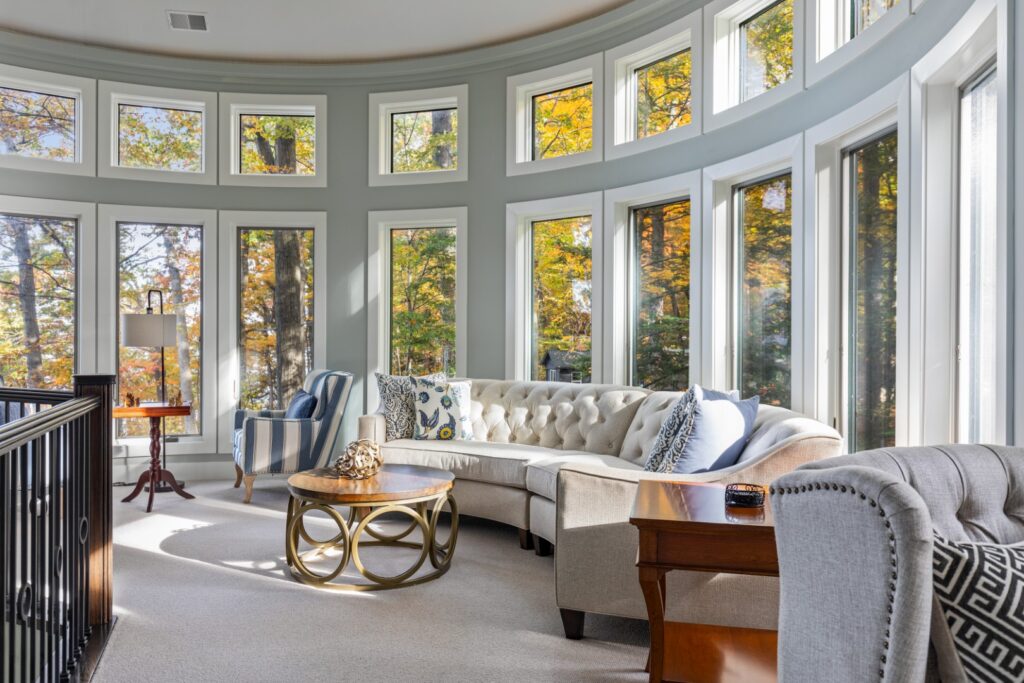 Bright living room with large curved windows