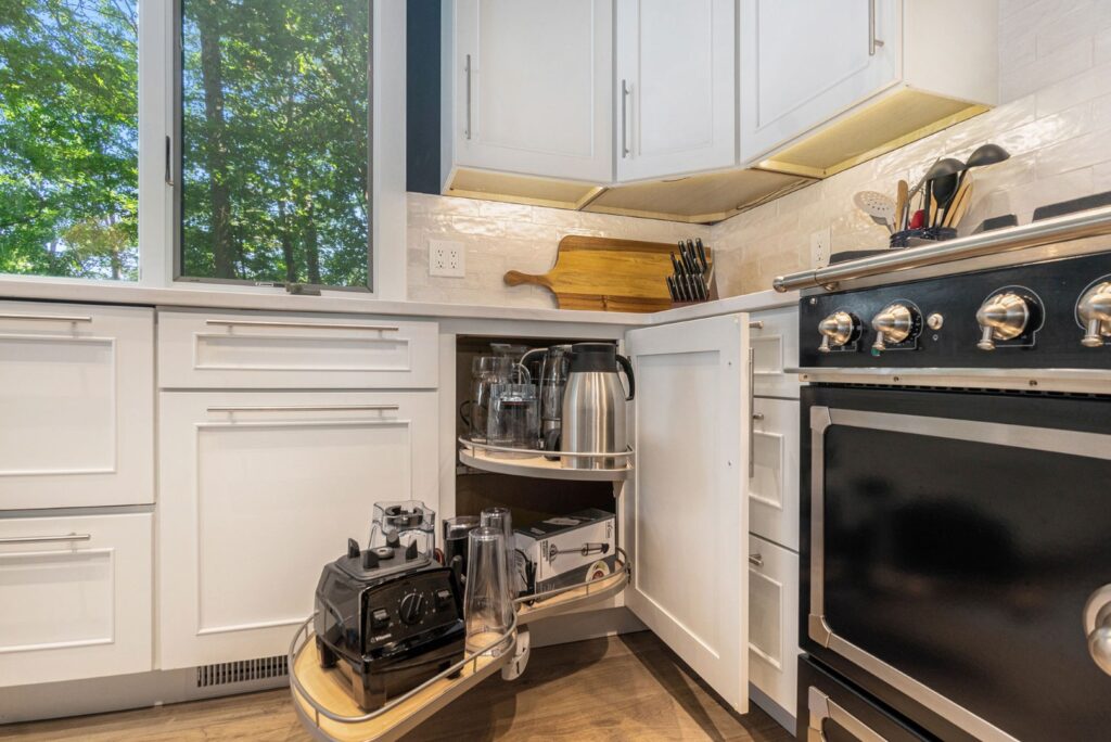 Modern kitchen with pull-out corner cabinet storage
