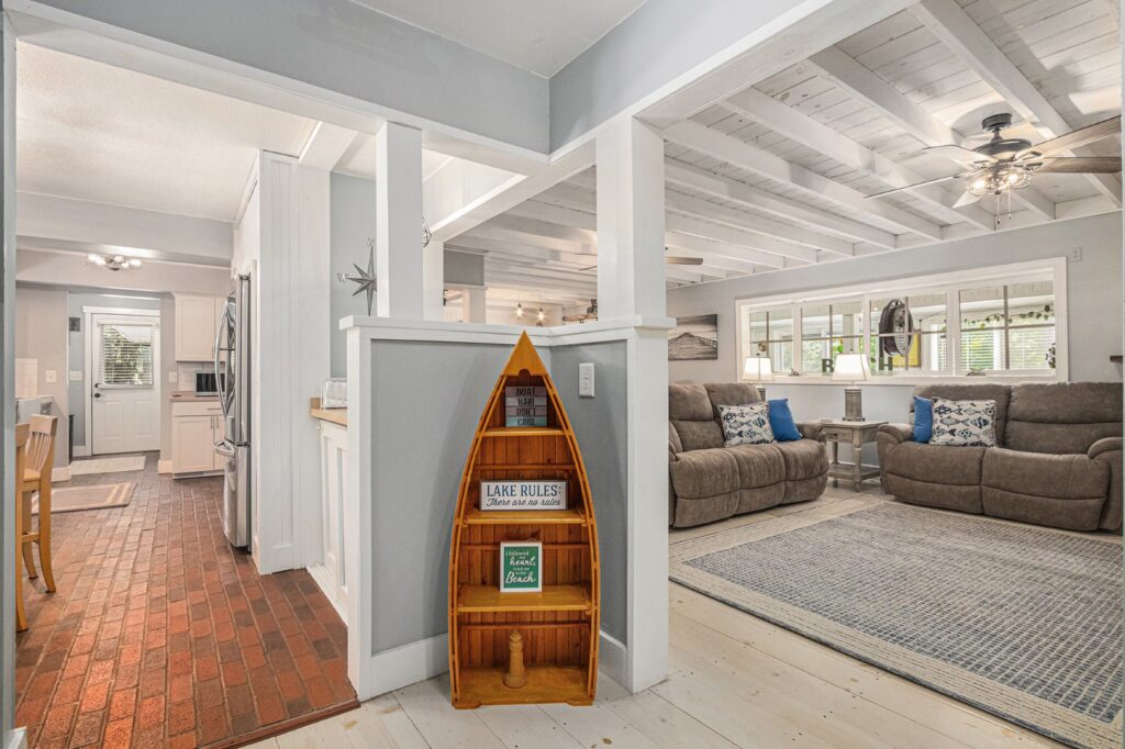 Cozy lake house living room and kitchen interior