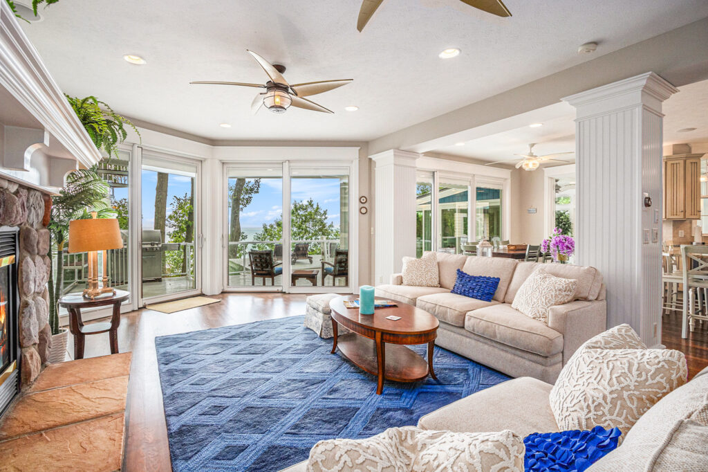 Bright living room with lake view windows