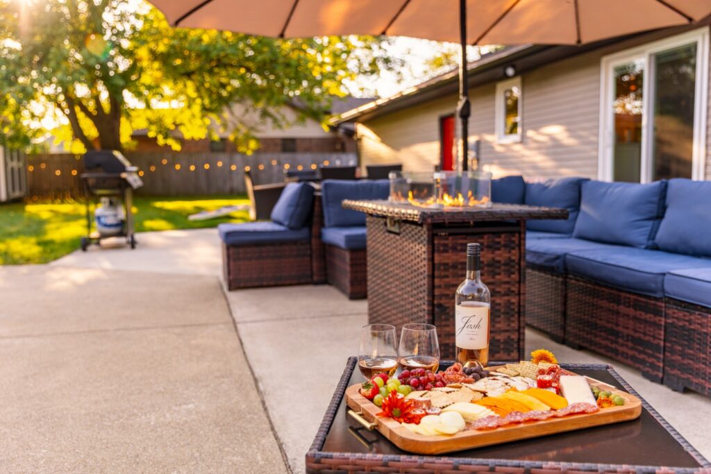 Outdoor patio with wine and charcuterie board