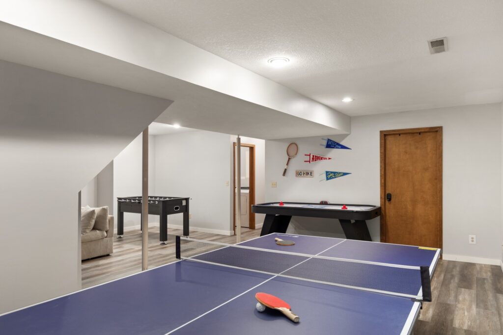 Basement game room with ping pong table