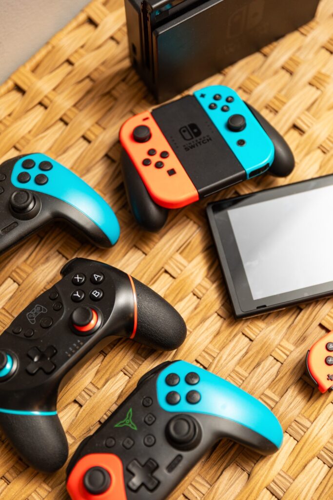 Nintendo Switch console and controllers on table