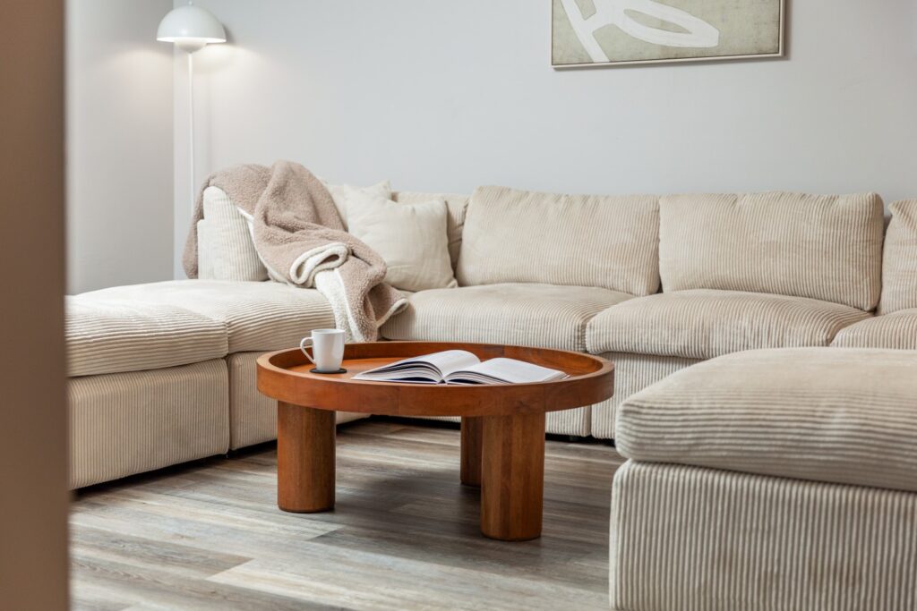Cozy living room with beige sofa and coffee table