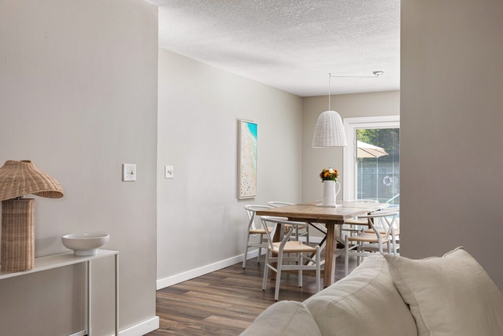 Bright modern dining room with wooden table