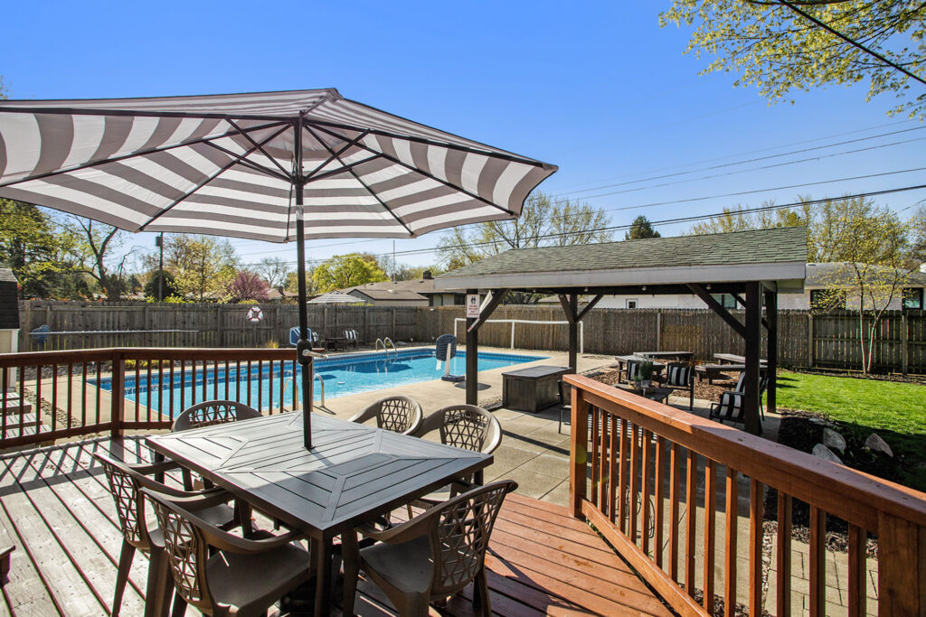 Backyard patio with pool and outdoor seating
