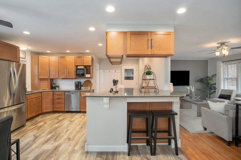 Modern kitchen with wooden cabinets and breakfast bar