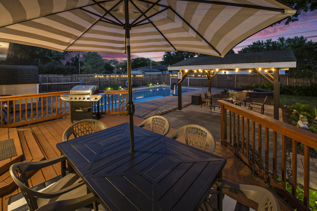Backyard patio with pool and outdoor seating