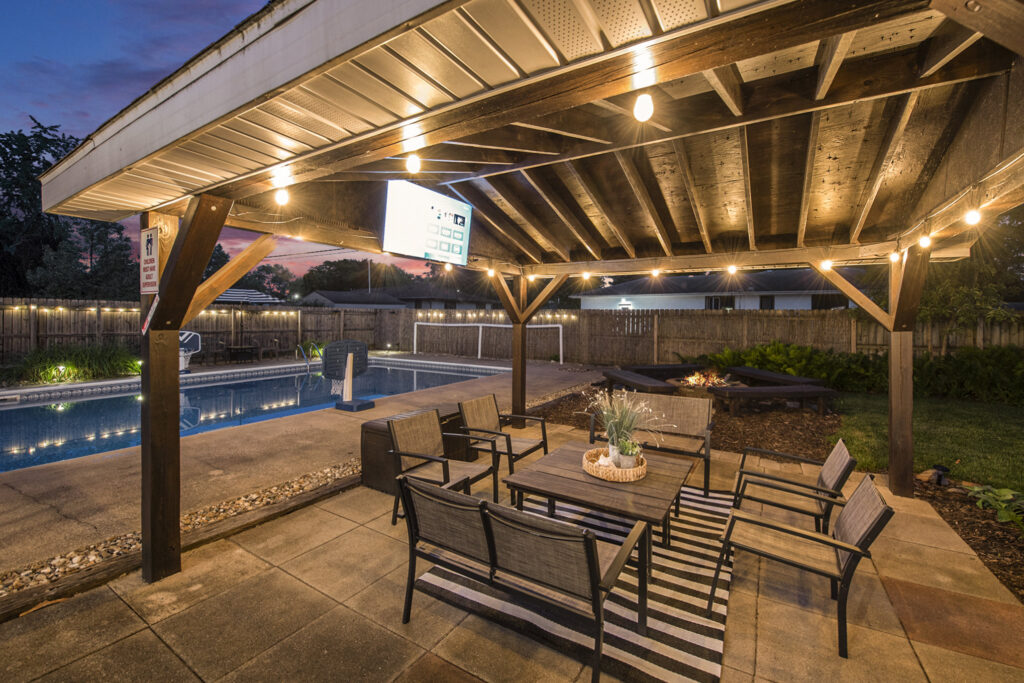 Backyard patio with pergola and swimming pool